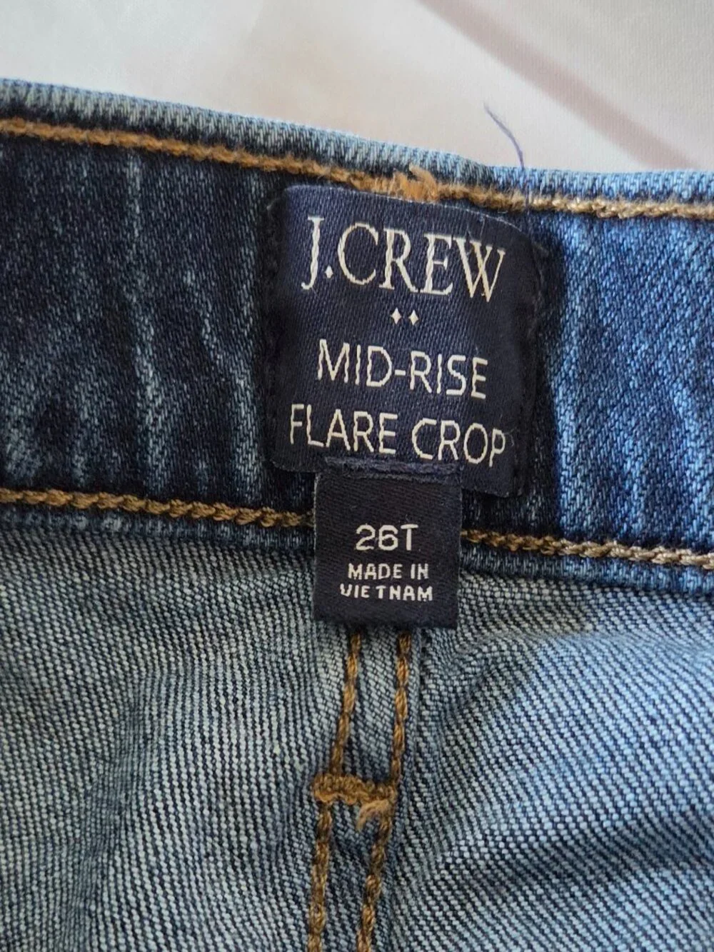 J. Crew Mid-Rise Flare Crop Jeans Women’s 26T, exposed button fly closure